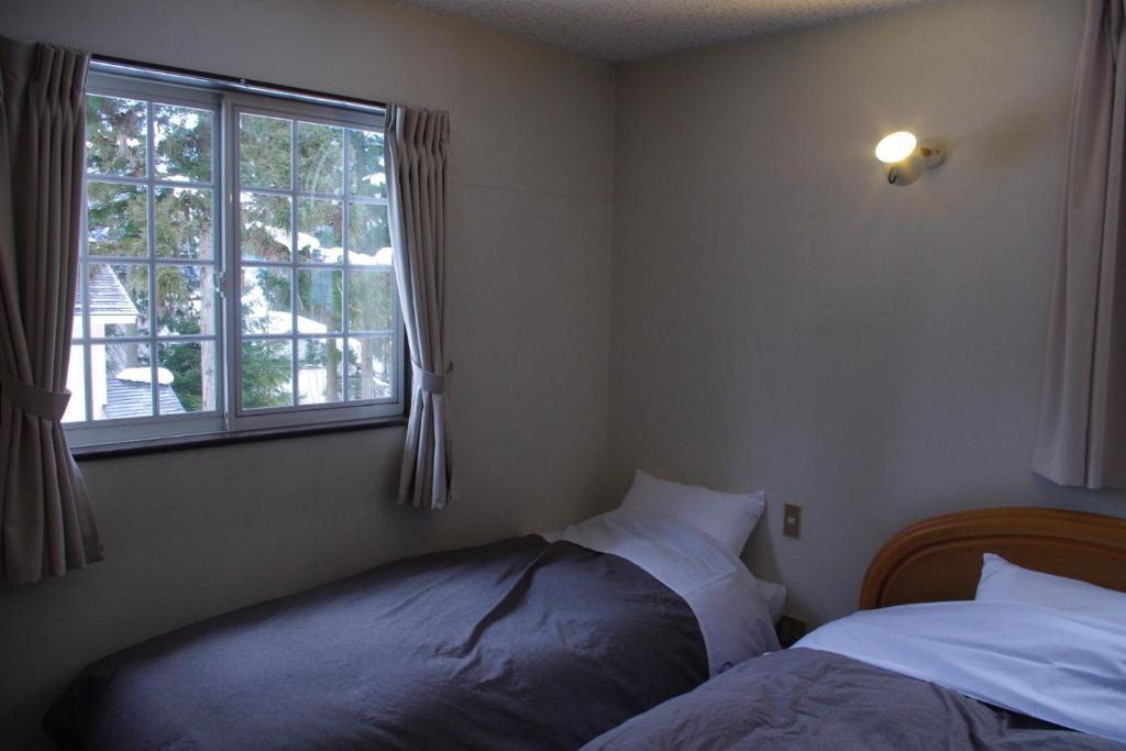 하쿠바 써니 사이드 헛 B&B 객실 사진
